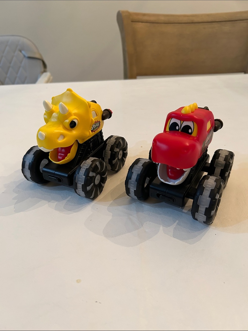 Yellow and Red Dino Monster Truck Toys